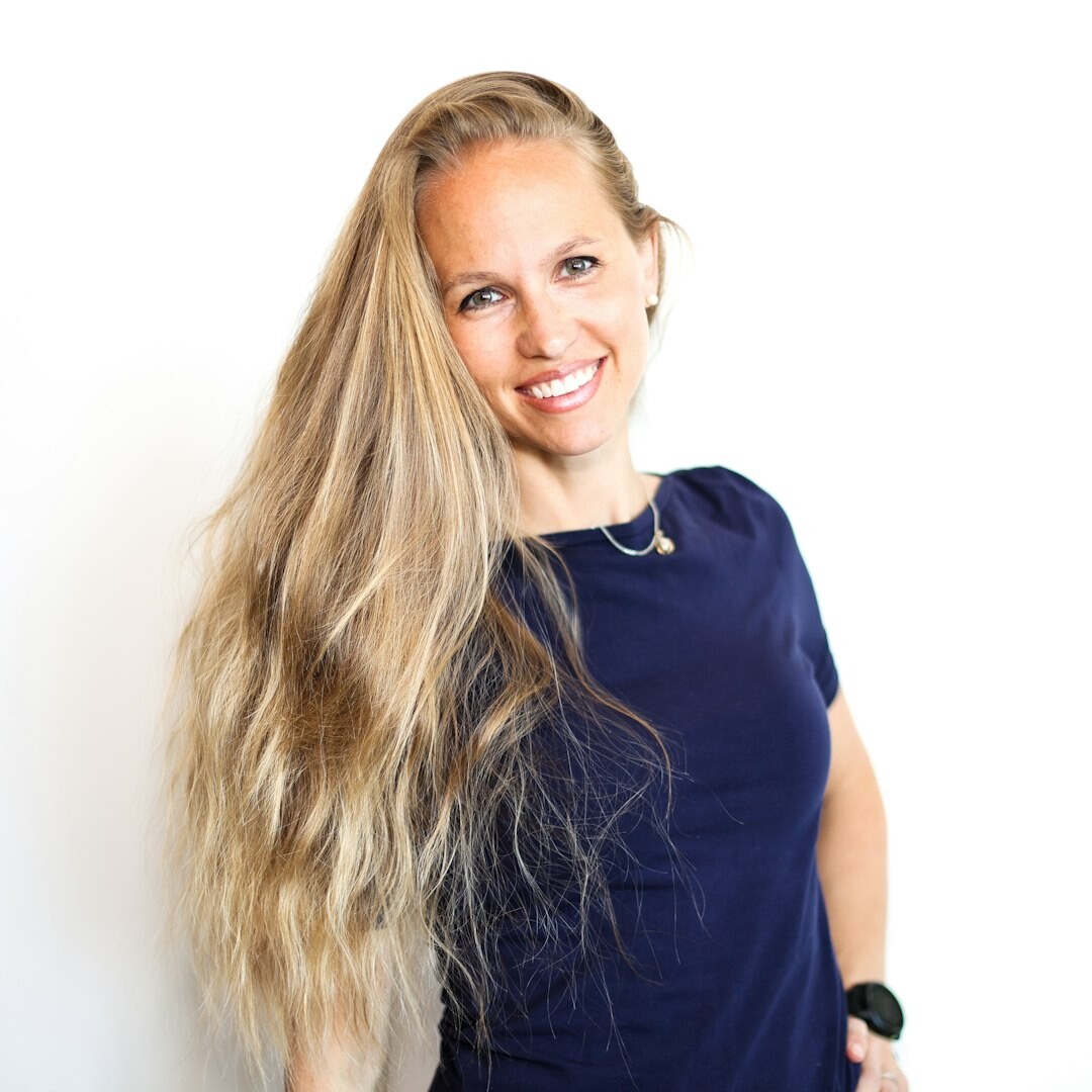 Professional female voice instructor in a studio